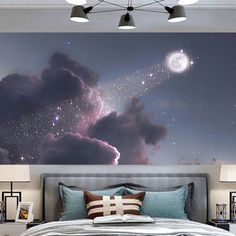 a bed room with a neatly made bed and a night sky mural