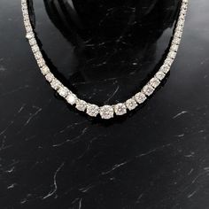 This beautiful Graduated Tennis Necklace features 11.89ct total weight of Lab Grown Diamonds from 2mm (0.03ct) to 6.9mm ( 1.20ct) E-F VS quality set in 14k white gold 4 prong tennis necklace . Total weight of necklace is 24.9gr . Appraisal stating all details of the necklace will be sent with necklace .  Return accepted within 7days of delivery , the item must be returned in the same condition as delivered with all original packaging and documents .  This necklace can be customized in different Luxury Brilliant Cut Platinum Gemstones, Luxury Platinum Bridal Necklace With Single Cut Diamonds, Luxury Bridal Necklace In Platinum With Single Cut Diamonds, Luxury Diamond Gemstones For Formal Occasions, Luxury Round Gemstones With Diamond Accents, Luxury Gemstones With Diamond Accents, Luxury Diamond Gemstone Necklace For Formal Occasions, Luxury Diamond Necklace With Gemstone For Formal Occasions, Luxury Round Platinum Bridal Necklace