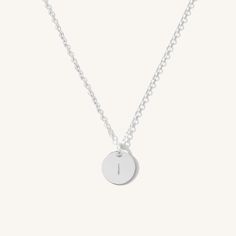 Our Dainty Initial Necklace will be your next favorite necklace - it’s simple, minimal, and so versatile! Make it your own by wearing a loved one’s initials or your own initial. It also makes the perfect personalized gift for a new mama, your bridesmaids, your friend’s birthday, and everyone else you love. You can wear it every day - yes, even in the shower and to sleep! DETAILS 14k gold filled -or- sterling silver necklace Necklace length: 16" with 2" extender Coin diameter: 9mm Safe for sensi Affordable Dainty Round Initial Necklace, Cheap Simple Initial Necklace For Everyday, Cheap Dainty Initials Necklace, Affordable Minimalist Adjustable Initial Necklace, Dainty Initial Necklace, New Mama, Detailed Necklace, Types Of Gold, Sterling Silver Initial