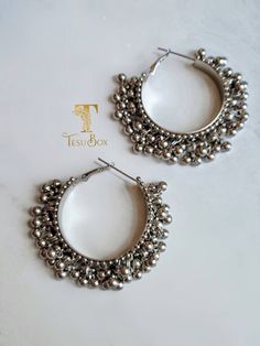 Bollywood Ghungroo hoops. Lightweight earrings with ghungroo beads Pair with Kurt's or tops for a fun, effortless statement look! ✓As always this is a high quality piece. Our Jewelry does not tarnish. Please keep in airtight container away from moisture and fragrances. ✓Free shipping in USA over $35. ✓Please ask all questions regarding color, size, measurements etc before you buy ✓ Please note that the ethnic Indian/Pakistani earring posts are usually thicker than normal. If you are not used to Nickel-free Dangle Hoop Earrings For Festive Occasions, Festive Nickel-free Dangle Hoop Earrings, Traditional Beaded Hoop Earrings For Festive Occasions, Bohemian Hoop Earrings With Dangling Beads For Festive Occasions, Traditional Festive Beaded Hoop Earrings, Silver Bohemian Hoop Earrings For Celebration, Festive Metal Hoop Earrings With Latkans, Bohemian Hoop Earrings For Parties And Festivals, Festive Bohemian Metal Hoop Earrings