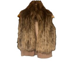 This is a brand-new Brown, fake fur gilet waistcoat. a very warm waist coat for wintry days. perfect for the start of autumn, or the end of winter. it is a rare find: ginger coloured fur, within the elasticated bottom and a zip only one in this design. Brown Faux Fur Coat For Cold Weather, Brown Faux Fur Trim Vest For Fall, Brown Vest With Faux Fur Trim For Fall, Winter Faux Fur Vest With Fur Trim, Winter Faux Fur Vest With Trim, Brown Waistcoat, Coffee Pins, Fur Gilet, End Of Winter