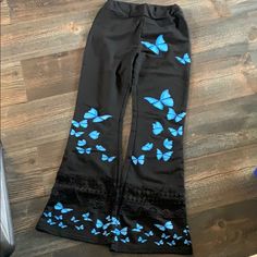 Very Cute Lounge/Yoga Pants Featuring Blue Butterflies And Crochet Detail On Bottom. Has Elastic Waist. Brand New Never Worn Just No Tags. Casual Summer Bottoms With Butterfly Print, Casual Butterfly Print Bottoms For Summer, Casual Bottoms With Butterfly Embroidery For Spring, Summer Cotton Bottoms With Butterfly Print, Trendy Cotton Bottoms With Butterfly Print, Butterfly Yoga, Butterfly Pants, Cute Lounge, Blue Butterflies