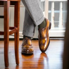 Handmade in 7 days. Made in Spain This beautiful cognac patina finish is all made by hand. Not only is the shoe hand sewn, but the finish is hand rubbed to achieve that antique coloration of slight burnishing rubbed into the patina. A classic wing tip style lace up, the full brogue has the perforated medallion on the toe box. Great for spring, summer and fall with suits, trousers and jeans. Brown Italian Wingtip Dress Shoes, Cognac Goodyear Welted Cap Toe Dress Shoes, Cognac Cap Toe Dress Shoes With Goodyear Welted, Cognac Cap Toe Dress Shoes Goodyear Welted, Brown Goodyear Welted Wingtip Dress Shoes, Cognac Goodyear Welted Wingtip Oxfords, Brown Italian Wingtip Leather Shoes, Cognac Goodyear Welted Wingtip Leather Shoes, Brown Leather Wingtip Shoes With Goodyear Welt