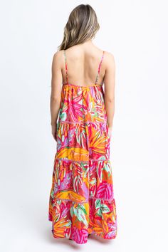 Go with the flow and embrace the island vibes with this must-have piece. #vacaymode Beachy Maxi Dress With Tropical Print For Beach Cover-up, Tropical Multicolor Dress With Palm Tree Print, Tropical Dress With Vibrant Print For Day Out, Tropical Multicolor Palm Tree Print Dresses, Vacation Floral Print Maxi Dress For Brunch, Floral Print Maxi Dress For Vacation Brunch, Beach Season Tropical Print Maxi Dress For Day Out, Tropical Print Maxi Dress For Beach Day Out, Multicolor Summer Dresses With Palm Tree Print