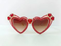 This Sunglasses item by PicaPicaFeathers has 433 favorites from Etsy shoppers. Ships from United Kingdom. Listed on Feb 20, 2023 Bling Sunglasses, Sunglasses Box, Red Love Heart, Shaped Sunglasses, Red Love, Heart Shaped Sunglasses, Heart Sunglasses, Red Crystals, Burning Man