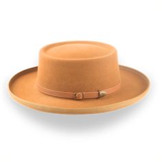 Description Materials Craftsmanship Hat Care Shipping Returns Product Description A Gambler Style Cowboy Hat for All Occasions Discover the perfect blend of style and comfort with the Ithaca, a gambler-style cowboy hat crafted from premium rabbit fur felt. This hat features a distinctive telescope crown and a 3 1/2" ribbon-bound rolled brim, ensuring a standout look that captures rugged elegance. The leather hat belt adds a touch of refinement, while the viscose satin lining and genuine leather Mens Felt Hats, Cowboy Hat Crafts, Spanish Hat, Homburg Hat, Gambler Hat, Mens Hats Fashion, Fedora Hat Men, Homburg, Chapeau Cowboy