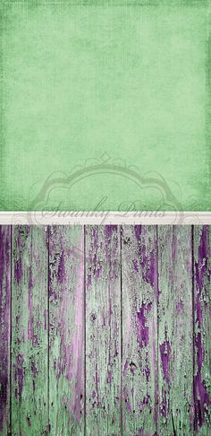 an old wooden background with purple and green paint