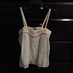 American Eagle Flowy Tank. Size Small. Nwt. Gauze Material. White Bohemian Cotton Camisole, White Cotton Camisole For Vacation, Casual Cream Camisole For The Beach, Casual White Camisole For Daywear, White Lace Trim Camisole Casual Style, White Lace Trim Casual Camisole, Thrift Finds Clothes, Sabrina Concert, Spaghetti Top