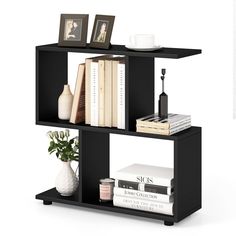 a book shelf with books and vases on top of it, against a white background