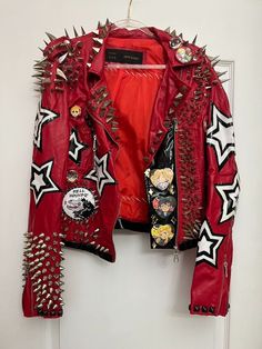 Persona 5 Phantom Thieves Atlus hand spiked faux leather shirt top punk jacket Unisex XS Description This auction is for a hand-customized Persona 5 Phantom Thieves-themed punk jacket. The charms and pins on it are a combination of official merchandise from Atlus and fan merch. The spikes are all real metal. The base jacket is from forever21 - there are some areas on it that have deteriorated over time due to the nature of the fabric. It fits a ladies XS-M or men's XS.  Bid with confidence!  My incredibly positive feedback means I am a reliable Ebay seller! Payment and Shipping   Shipping and handling for this will be free. Please do not purchase if you have 0 feedback unless you contact me first. This will be sent carefully packaged with a tracking number and insurance. Persona 5 Phantom Thieves, Punk Vest, Punk Clothes, Faux Leather Shirt, Phantom Thieves, Punk Jacket, 80s Punk, Tomboy Outfits, Punk Outfits