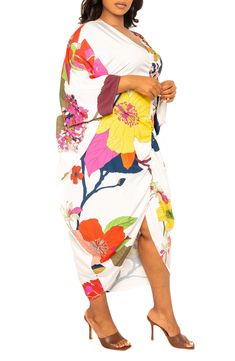 Enter the tropics everytime you slip into this vivid floral dress boasting a billowy caftan silhouette that's fit for your next paradise venture. V-neck Bracelet-length sleeves Unlined 95% polyester, 5% spandex Hand wash, line dry Imported Vibrant Spring Dress With Kimono Sleeves, Tropical Dress With Kimono Sleeves, Multicolor Tropical Print Kaftan For Spring, Spring Tropical Kaftan With Kimono Sleeves, Tropical Spring Kaftan With Kimono Sleeves, Tropical Kaftan With Kimono Sleeves For Spring, Spring Tropical Print Multicolor Kaftan, Vibrant Floral Print Spring Kaftan, Spring Floral Print Vibrant Kaftan