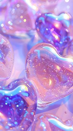 several heart shaped bubbles floating on top of each other