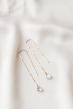 Stylish, high-quality, handmade earrings made of gold-plated stainless steel with a moonstone drop pendant. Ideal as a gift for a friend or sister! Also beautiful as subtle bridal earrings! ✷ Chains made of gold-plated stainless steel - super compatible with sensitive ears - stay beautiful for a long time and do not turn black ✷ Drops of moonstone Each product is carefully handmade, which is why slight deviations from the product photos are possible. According to Section 19 Paragraph 1 of the VA Delicate Adjustable Threader Earrings With Long Drop, Delicate Adjustable Threader Earrings As A Gift, Handmade Briolette Earrings In Minimalist Style, Handmade Dangle Threader Earrings As Gift, Minimalist Briolette Earrings With Ear Wire, Minimalist Briolette Jewelry With Ear Wire, Handmade Minimalist Threader Earrings, Delicate Dangle Threader Earrings For Gift, Delicate Dangle Threader Earrings As Gift