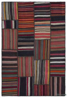 multicolored patchwork rugs are arranged in different patterns and sizes, all on top of each other