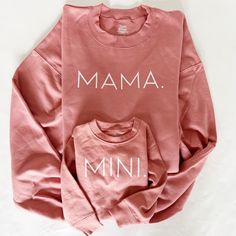 Mommy and Me Mauve Pullover Set. Get cozy with mom and kid. You can match with mauve for a girl mom matching or add your boy with our sea foam green that pairs so perfectly with the mauve.  Unisex sizing: 50/50 cotton/poly ---How To Order --- 1-) Choose your shirt size and color (adult sizes are Mama, Child sizes Mini) 2-) Click add to cart. You can go back to add more product 3-)Click "Proceed to check out" Unisex Shirts are unisex sizing. Women size down for a more fitted look.  ---Production Family Matching Pink Tops For Fall, Casual Tops With Name Print For Loungewear, Casual Pink Tops For Family, Family Matching Cotton Tops For Loungewear, Long Sleeve Tops With Name Print For Family, Matching Cotton Tops For Loungewear, Long Sleeve Tops With Letter Print, Everyday Family Matching Tops With Text Print, Long Sleeve Tops For Mother's Day Loungewear