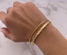 Rigid gold cuff bracelet made of stainless steel. Water and erosion resistant. Doesn't change color with use. Maximum wrist size 6.5 inches. Hammered Bangles, Gold Cuff Bracelet, Gold Armband, Gold Bracelet Cuff, Gold Cuffs, Gold Bangle Bracelet, Gold Bangle, Bracelet Gold, Steel Water