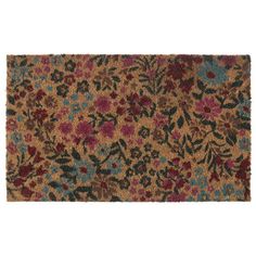 an area rug with flowers and leaves in brown, blue, red and green colors