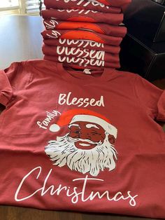 Black Santa is always a vibe! Order now to get your matching family shirts for the holiday! Shirts are printed on 100% bella canvas shirts. Blessed Christmas, Blessed Family, Matching Family Shirts, Black Santa, Family Shirts Matching, Shirts Black, Family Christmas Shirts, Christmas Family, Holiday Shirts