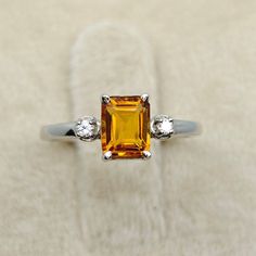 Natural Citrine Ring For Women.  Stone:- Natural Citrine Stone Colour:- Yellow Stone Shape:- Octagon Faceted Stone Size:- 6.15x5.25 MM Stone Clarity:- Loop Clean Metal:- 925 Silver Ring Weight:- 1.90 Gm Emerald Cut Citrine Rings, Citrine Crystal Promise Ring, Hallmarked Citrine Rings, Formal Orange Sterling Silver Rings, Silver Citrine Promise Ring, Amber Topaz Sterling Silver Promise Ring, Amber Topaz Ring In Sterling Silver For Promise, Fine Jewelry Citrine Crystal Ring, White Gold Citrine Promise Ring