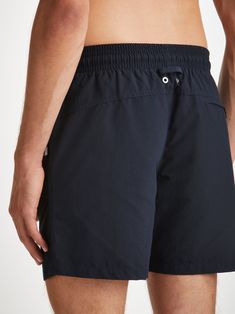 Designed for a relaxed look, our classic style swimming trunk has a fully elasticated waistband and drawstring tie for the perfect fit. The braided drawstring ends are complemented with metal aglets for a luxe finish and the back of the swim shorts feature matching metal eyelets for easy air and water drainage. Unlike most men's swimwear, our inner mesh lining is seamless for a more comfortable fit and our mesh-lined back pocket features a pin-lock zip that locks into place when flat to keep you Derek Rose, Pin Lock, Men's Swimwear, Navy Man, Swim Short, Mens Swim Shorts, Holiday Essentials, Man Swimming, Aruba