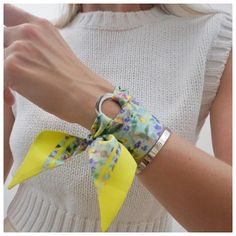 Imagine butterflies dance across the meadow in front of you as you make your way through the tall grass in a little floaty dress. Wildflower meadow bursting with blooms may seem like a spring dream, but this bracelet can be your everyday reminder of the blooming beauty around you.The Lou silk bracelet is one of our warm season gems for the more adventurous fashionistas. The multi-functional silk scarf is handcrafted from the finest silk twill fabric and can be worn as a choker, mini silk scarf, Silk Scarf With Ribbon For Gift, Bohemian Silk Scarf Gift For Spring, Trendy Green Silk Scarf For Spring, Trendy Silk Scarf For Spring Gift, Elegant Handmade Silk Scarf For Summer, Handmade Silk Scarf As Summer Gift, Handmade Silk Scarf Summer Gift, Chic Adjustable Silk Scarf For Summer, Elegant Silk Scarf For Summer Gift