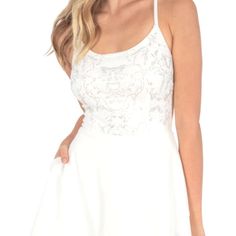 Beautiful, Speechless Dress With Rounded Neckline Spaghetti Straps Fitted Bodice With Silver Floral Accents Crisscross Open Back. Size 9. White Lace Back Mini Dress For Summer, White Lace Back Summer Dress, White Summer Dresses With Lace Back, White Summer Dress With Lace Back, Wedding Mini Dress With Lace Bodice And Spaghetti Straps, White Mini Dress With Lace Trim And Fitted Bodice, White Mini Dress With Lace Back For Spring, White Fitted Dress With Lace Bodice, White Sleeveless Dress For Homecoming