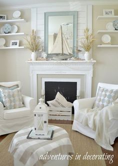 a living room filled with furniture and a fire place in front of a white fireplace