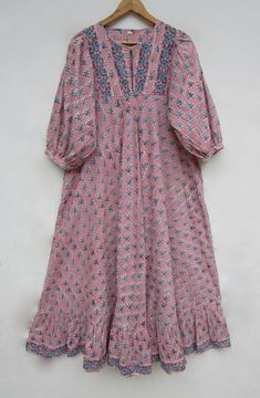 ITEM DESCRIPTION summer pink booty printed cotton long maxi dress - Henley neckline with button dress - 3/4th sleeve with button maxi Features: 3/4th sleeve, Henley neck, Long dress Fabric: 100% Cotton cambric hand block printed fabrics  Sleeve Length = 18 inch For more sizes & their measurement, please refer our below chart to understand the sizes variations available with us For your size requirement, please mention your size in seller note at the time of buying. SIZE MEASUREMENT  BUSTLENGTHSHOULDER XXS34 inch51 inch13.5 inch XS36 inch51 inch14 inch S38 inch51 inch14.5 inch M40 inch51 inch15 inch L42 inch51 inch16 inch XL44 inch51 inch16.5 inch 2XL46 inch51 inch17 inch 3XL48 inch51 inch18 inch   Company Return Policy:  Please write for more information to my email directly CHOOSE "ASK SE Pink Half-sleeve Beach Dress, Pink Half Sleeve Beach Dress, Pink Half-sleeve Maxi Dress For Spring, Pink Floral Print Dresses With 3/4 Sleeve, Pink Floral Print Dress With 3/4 Sleeves, Pink Half Sleeve Maxi Dress For Spring, Pink Printed Floor-length Maxi Dress, Pink Floor-length Midi Dress For Beach, Pink Beach Dress With 3/4 Sleeves