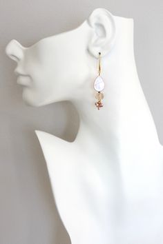 18k gold plated brass earrings with mother-of-pearl, glass, and freshwater pearls. Each earring weighs .12oz and measures 2.5in from top of hook. Mother Of Pearl Earrings, Multi Strand Necklace, Gift Card Sale, Brass Earrings, Multi Strand, Mother Of Pearl, Freshwater Pearls, Pearl Earrings, 18k Gold