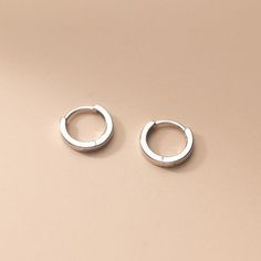 A Pair Of Classic Plain Silver Hoop Huggies Earrings Description: ............................................ Metal: The Earrings Are Made From Solid 925 Sterling Silver, Finest Silver, Nickel Free Measurement: - Hoop(Outer) Diameter Options: Approximately 13mm; - Hoop(Inner) Diameter Options: Approximately 11mm - Width Of Hoop Is About 2mm/0.08 Inches; - Thickness Approximately 1.2mm/0.05inches; Earring Closure: Hinged-Hoop Color: Silver. ................................................ This I Silver Dainty Hoop Earrings, Small Silver Earrings, Marcasite Earrings, Huggie Earrings Silver, Pineapple Earrings, Dainty Hoop Earrings, Jeweled Earrings, Geometric Earrings, Silver Hoops