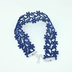 Rock the neck-flattering Zara Royal Blue Wide Choker on a special occasion or whenever you want to add a touch of elegance and sensuality to your outfit. Two rows of royal blue dainty flowers are embroidered together to form this 1-inch wide floral choker. It is soft and flexible making it easy to wear and enjoy all day. This dainty royal blue wide choker will be a classy and sophisticated addition to many different outfits. Lightweight, wear-resistant design Blends it well with other jewelry it Swarovski Butterfly, Floral Choker, Dainty Flowers, Lace Choker, Neck Choker, Different Outfits, Beaded Dangles, 1 Inch, Royal Blue