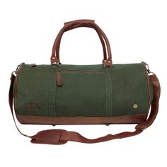 Materials: 100% cotton canvas and full grain leather exterior. 100% cotton lining interior. Dimensions: W53cm x H28cm x D28cm, handle: L66cm W3.8cm, extendable shoulder strap: L78cm-L145cm. Hardware: Brass fittings and robust YKK zippers. Features: Extendable detachable shoulder strap, inside zip pocket, outside zip pocket, leather clip on the grab handles for comfortable grip, four brass studs on the leather base. Combining great styling with rugged practicality, our Gym Duffle in Green Canvas Green Duffle Bag, Boho Tote Bag, Boho Tote, Leather Weekender Bag, Gym Gear, Weekend Bag, Leather Luggage, Mahi Mahi, Unisex Accessories