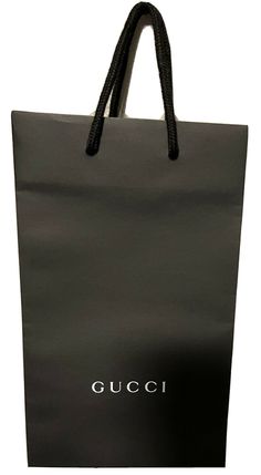 GUCCI Classic Black Shopping Bag 11.41" X 6.7" X 4.75 All Matte black with Gucci logo in white font Small size perfect for gift giving Great design in classic color Ships First Class USPS Rectangular Gucci Shopping Bag, Black Gucci Bag For Everyday Use, Modern Black Gucci Bags, Black Gucci Bags For Formal Occasions, Gucci Black Bag As Gift, Rectangular Gucci Bag For Gift, Black Gucci Bag As Gift, Black Rectangular Gift Bag, Modern Black Bag For Gift