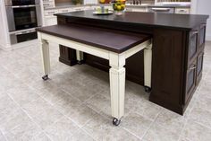 a large kitchen island sitting in the middle of a room