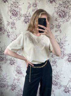 "- Vintage embroidered top - Good vintage condition - TAG SIZE: UK 10, F 38, NL 36, DK 36, A 36, L 38 - Fabric information: 100% polyester Estimated to fit XS-S-M based on your desired fit. Measurements (laying flat): - Shoulders (back) 39 cm - Length: 71 cm - Sleeve: 27 cm Vintage clothes may come with minor flaws due to pre-loved wear. But most importantly it is a one-of-a-kind piece with its own character. By shopping secondhand you're giving a second life and not contributing to the fast fas Elegant Short Sleeve Embroidered Top For Spring, Fitted Vintage Embroidered Short Sleeve Top, Fitted Vintage Embroidered Top With Short Sleeves, Vintage Embroidered Short Sleeve Tops, Vintage Floral Embroidered Short Sleeve Top, Vintage Clothes, Embroidered Top, Second Life, Fast Fashion