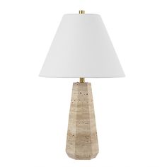 a table lamp with a white shade on it