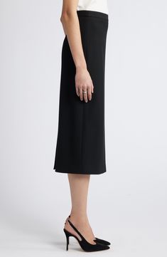 The smooth, stretchy fabric of this streamlined pencil skirt lets you effortlessly transition from desk to dinner. Lined 68% polyester, 28% viscose, 4% spandex Dry clean Imported Chic Stretch Formal Pencil Skirt, Chic Stretch Pencil Skirt For Formal Occasions, Evening Midi Skirt In Elastane, Sleek Fitted Midi Skirt, Formal Stretch Pencil Skirt In Solid Color, Classic Stretch Midi Pencil Skirt, Solid Color Elastane Midi Skirt, Elegant Workwear Skirt With 4-way Stretch, Black Elastane Pencil Skirt For Work