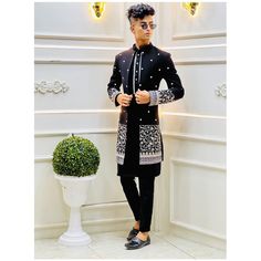 Black Dabka Kurta For Party, Traditional Black Bandhgala With Resham Embroidery, Elegant Black Kurta With Intricate Embroidery, Traditional Black Bandhgala For Party, Traditional Black Bandhgala For Festivals, Black Embroidered Nehru Jacket For Diwali, Elegant Black Bandhgala For Festivals, Fitted Black Bollywood Bandhgala, Designer Black Bandhgala With Intricate Embroidery