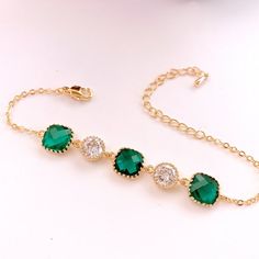 #jewelry #bracelets #chainlinkbracelets #dropearrings #dangleearrings #weddingearrings #bridesmaidearrings #bridalearrings #bridesmaidgift #studearrings #emeraldearrings #goldearrings #christmasearrings #jewerly #lalacrystal #gift for her Elegant Green Plated Jewelry, Elegant Crystal Bracelet With Cubic Zirconia Jewels, Elegant Cubic Zirconia Crystal Bracelet With Jewels, Elegant Gold Plated Bracelets For May Birthstone, Elegant Gold Plated Bracelets With Jewels, Elegant Cubic Zirconia Crystal Bracelet, Elegant Gold-plated Jeweled Bracelets, Elegant Gold-plated Crystal Bracelet, Gold Emerald Bracelets For Formal Occasions