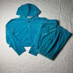 Juicy Couture Track Suit Set Women's Large Blue Aqua Velour Jacket Pants Vtg Y2k Hoodie Is Cropped, Pants Are Flared / Boot Cut Great Condition - No Holes Or Stains Pit To Pit (In): 20 Length From Shoulder To Bottom Hem (In): 18.5 Waist Measurement (Inches): 32 Inseam (Inches): 30 Included Pictures Of All Flaws And Signs Of Wear That I Could Spot To The Best Of My Ability. Do Not Hesitate To Message Me About More Details Regarding Condition, Sizing, Etc. Refer To Measurements To Ensure Best Fit As Used Pieces Or Certain Brands May Not Fit Traditional Sizing. Returns Allowed Within 30 Days Of Purchase But Buyer Must Pay For Return Shipping. Juicy Couture Track Suit, Velour Jacket, Juicy Couture Pants, Couture Pants, Y2k Hoodie, Track Suit, Waist Measurement, Suit Set, Cropped Pants