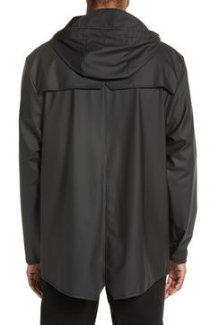 A minimalist raincoat with a matte waterproof finish is lightweight, durable and packable so you can be ready for whatever Mother Nature throws your way. 30" length (size Small) Front snap closure Stand collar; drawstring hood Waterproof 100% polyester with polyurethane coating Machine wash, line dry Imported