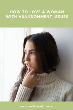 a woman leaning against a wall with the words how to love a woman with abondment issues