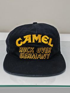 Extremely rare and in the best condition on the market! Vintage Black Baseball Cap With Flat Bill, Black Vintage Snapback Hat, Vintage Black Baseball Cap With Curved Brim, Vintage Black Snapback Hat, Vintage Black 5-panel Hat, Hat Cap, Trucker Cap, Caps Hats, Camel