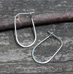 Hand formed sterling silver oblong hoops.These lovelies measure approximately 1.25" x .5"HOW TO properly put on any kind of hoop earring.  Copy and paste in your browser.https://www.instagram.com/lisasloveliesjewelry/ Hoops Silver, Jewelry Sale, Yoga Jewelry, Engraved Jewelry, Simple Earrings, Amethyst Ring, Silver Hoops, Silver Hoop Earrings, Wholesale Jewelry