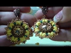 two pairs of yellow and green beaded earrings in the shape of sunflowers