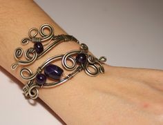 Purple Wire Wrapped Bracelet, Handmade Amethyst Cuff Bangle Bracelet, Purple Wire Wrapped Bangle Jewelry, Hand Wrapped Purple Bracelets As Gift, Unique Adjustable Amethyst Bracelets, Wire Wrapped Amethyst Bracelets In Purple, Purple Wire Wrapped Bracelets As Gift, Wire Wrapped Purple Amethyst Bracelets, Purple Amethyst Wire Wrapped Bracelets