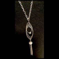 30” Adjustable Size, Silver Hoops And Chain Fringes Pendant Necklace! Has A Silver Lobster Claw Clasp. Makes An Excellent Gift For Yourself Or Your Loved Ones! Comes Already Gift Wrapped And In A Fancy Gold Gift Box! Comes From A Smoke And Pet Free Environment. Please Ask Any Questions You Have. Offers Welcome! Bundle Items From My Closet And Save! Thank You For Shopping With Us At Nancy’s Creative Treasures! New To Poshmark? Use Code Enderockz To Sign-Up And Save $10 On Your First Purchase! Adjustable Metal Lariat Necklace With Dangle, Metal Lariat Necklace With Adjustable Dangle Chain, Elegant Teardrop Stainless Steel Necklaces, Long Silver Chain Necklace, Adjustable Metal Drop Necklace With Delicate Chain, Adjustable Long Drop Necklace With Chain, Adjustable Long Chain Drop Necklace, Trendy Metal Lariat Necklace With Adjustable Chain, Metal Dangle Necklaces With Chain Detail