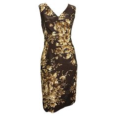 Presenting a fabulous brown floral Dolce and Gabbana sleeveless dress. From the Spring/Summer 1997 collection, this dress features a floral print that was heavily used on the season's runway. Approximate measurements: Size - removed Bust: 34 - 37" Waist: 32 - 33" Hips: 40 - 42" Shoulder to hem: 41" Elegant Sleeveless Silk Floral Dress, Elegant Silk Sleeveless Dress With Floral Print, Sleeveless Floral Dress For Summer Formal, Formal Sleeveless Floral Dress For Summer, Sleeveless Floral Dress For Formal Occasions, Fitted Silk Sleeveless Floral Dress, Fitted Sleeveless Silk Floral Dress, Formal Fitted Sleeveless Dress With Floral Print, Vintage Sleeveless Fitted Floral Dress