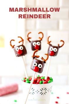 marshmallow reindeer lollipops in a cup with candy