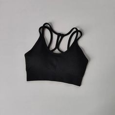 46380845891836|46380845957372|46380846186748 Black Seamless Tops With Built-in Bra, Solid Color Compression Sports Bra In Seamless Fabric, High Stretch Seamless Black Crop Top, Black Seamless Workout Tank Top, Black Seamless Tank Top For Workout, Black Seamless Construction Crop Top For Workout, Black Seamless Crop Top For Workout, High Stretch Black Tank Top For Gym, Black High Stretch Seamless Crop Top